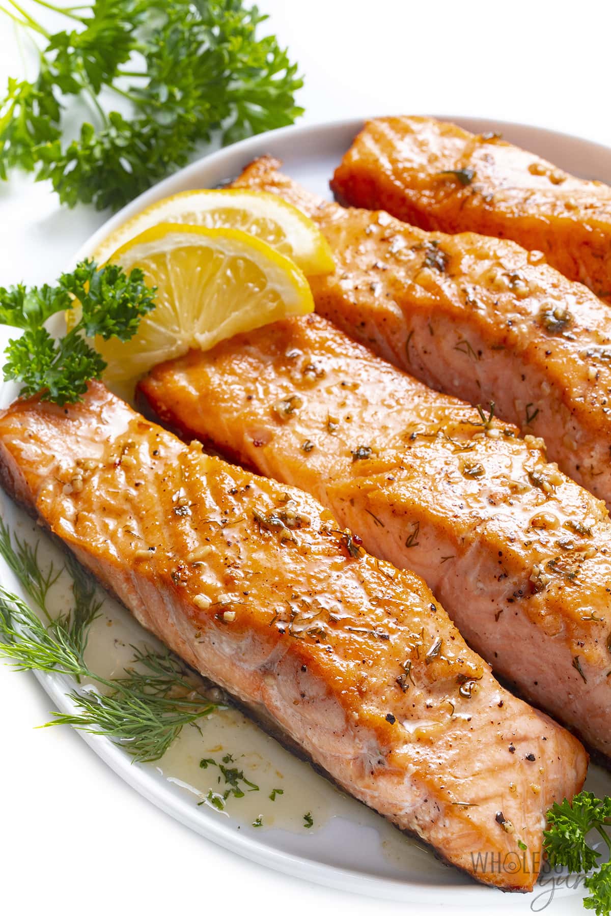 Plate with fillets and lemon wedges.